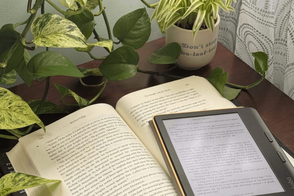 Kobo e-reader Kobo e-reader laying on an open book